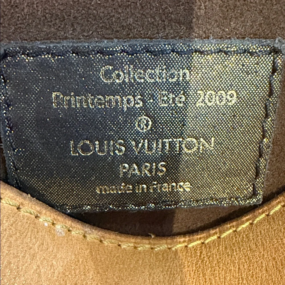 Louis Vuitton Brown Monogram Drawstring Shoulder Bag circa 2009